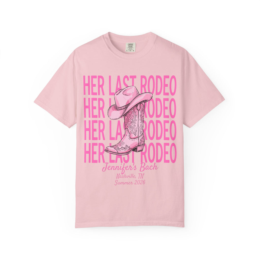 Pink t-shirt with "Her Last Rodeo" text and cowboy boot graphic.