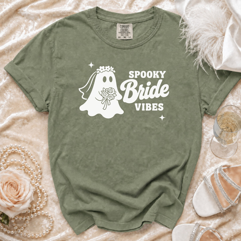 Olive green t-shirt with white "Spooky Bride Vibes" ghost graphic.