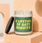 Glass candle with green label reading "Booked: A Lifetime of Date Nights"