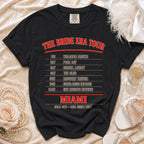 Black t-shirt with "The Bride Era Tour" and Miami itinerary including "She Regrets Nothing".