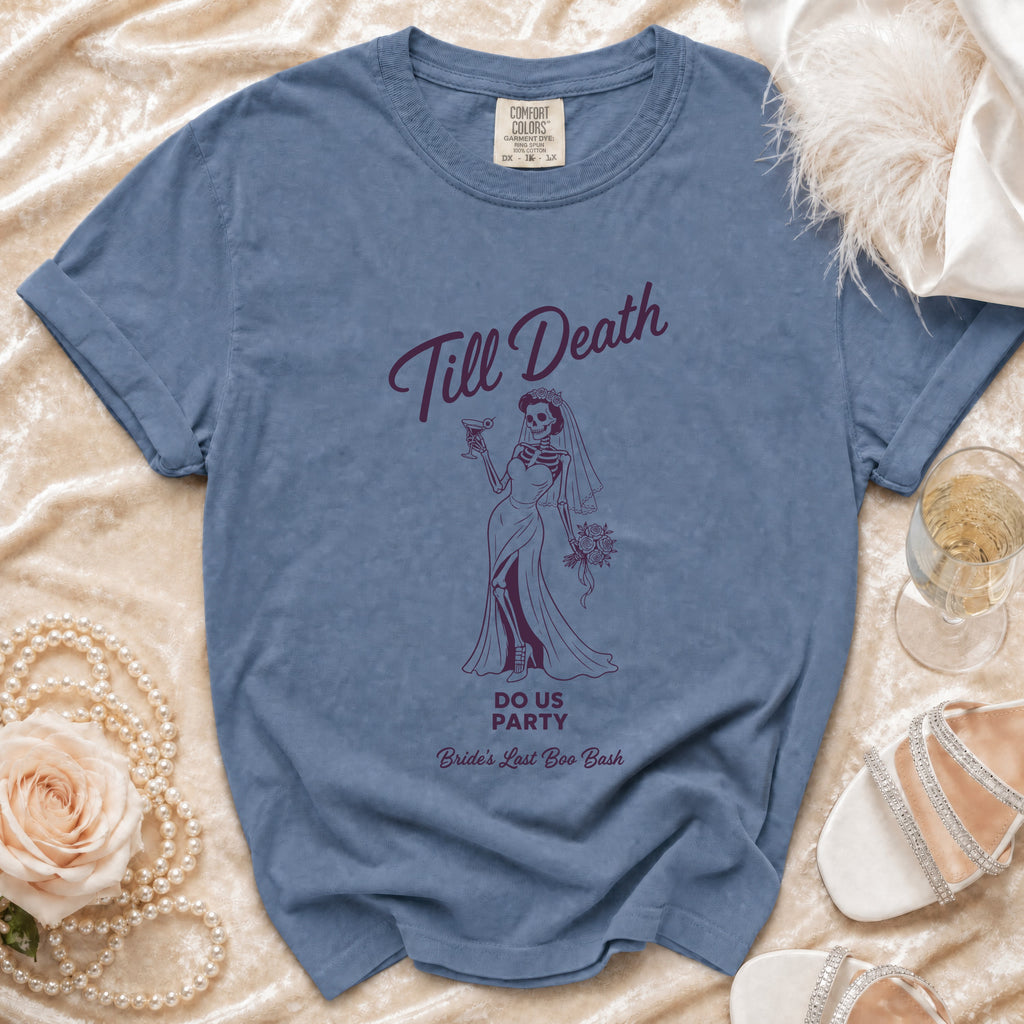 Blue t-shirt with skeleton bride graphic saying "Till Death DO US PARTY Bride's Last Boo Bash".