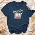 Navy t-shirt with "lucky in love" and slot machine graphic reading "JUST MARRIED".