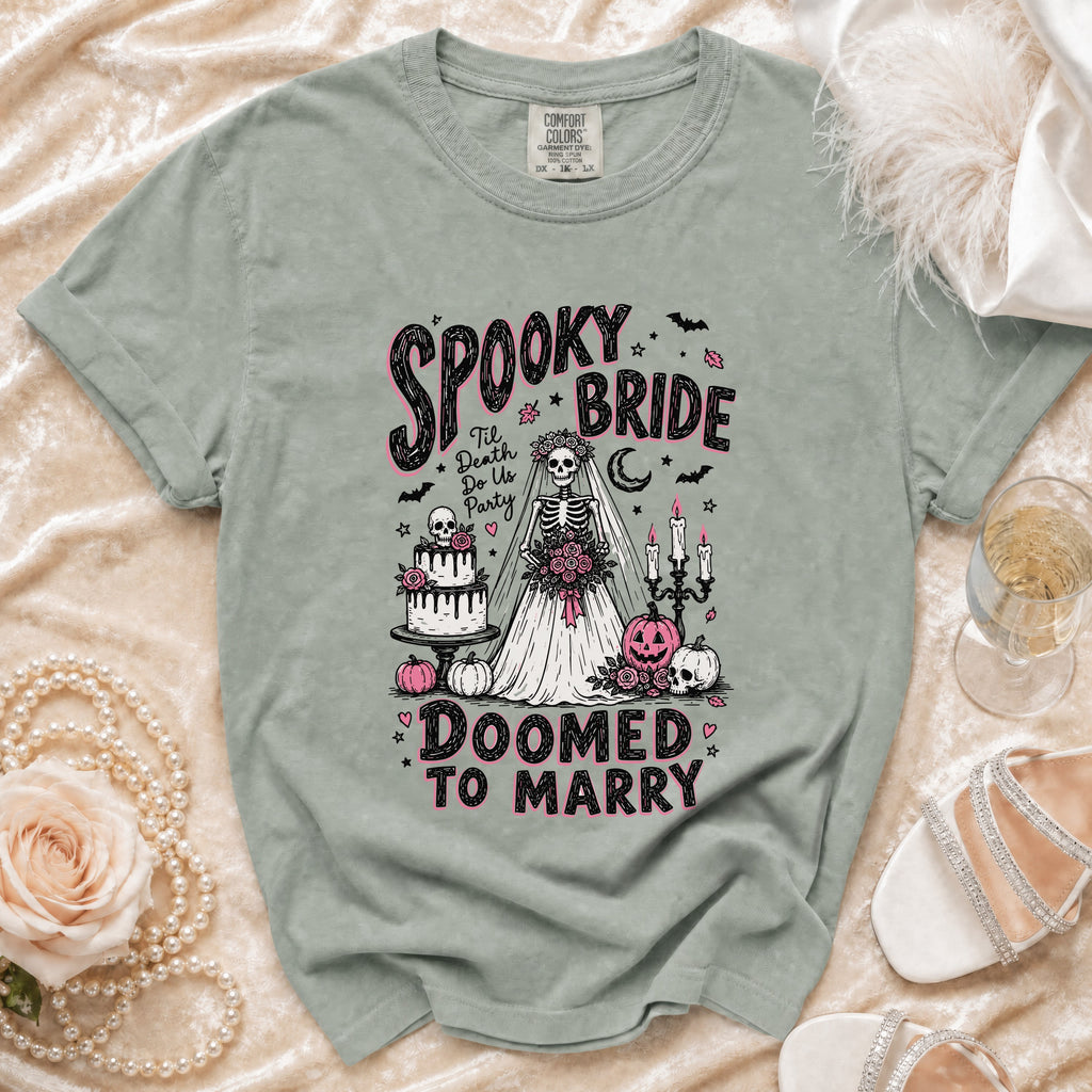 T-shirt graphic of a skeleton bride with text "Spooky Bride" and "Doomed to Marry".