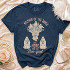 Navy shirt with "Mother of the Bride" text and ghost bride.