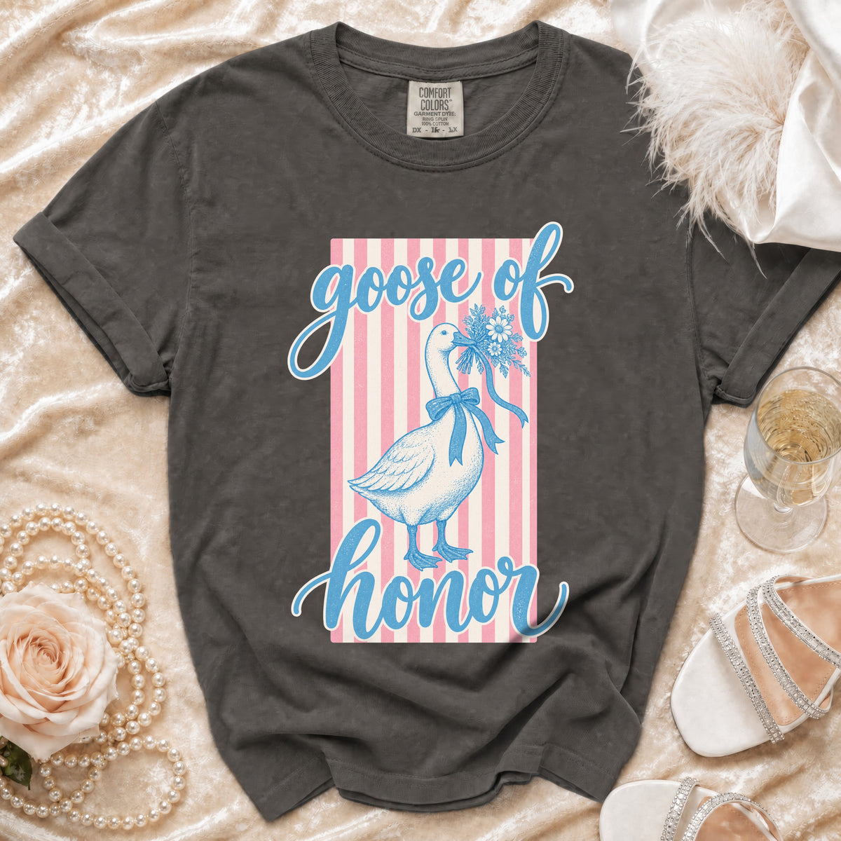 Gray t-shirt with "goose of honor" text and illustration of a goose holding flowers.