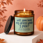 Amber candle with text "Will you hold my dress while I pee? because true friendshipisn't just emotional support".