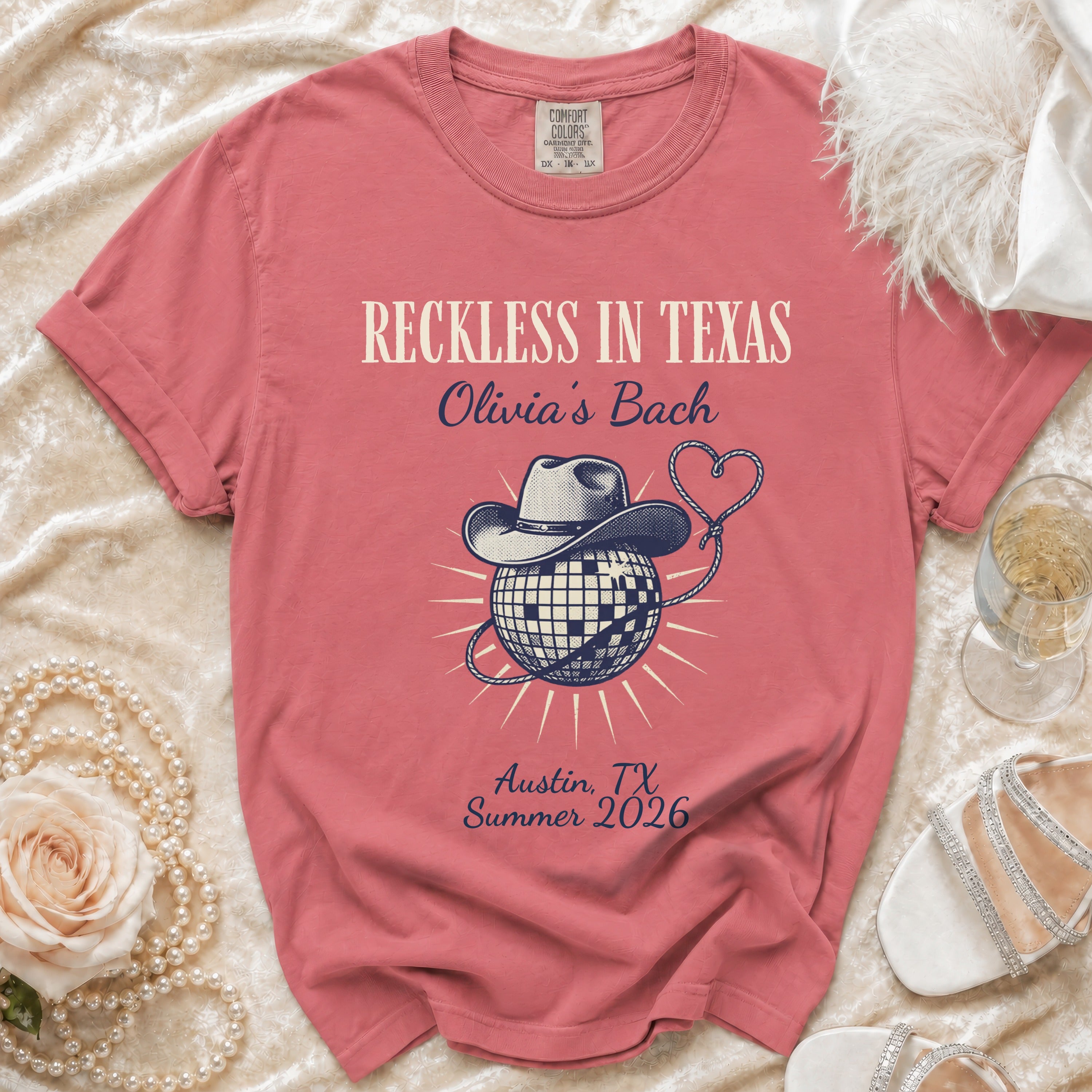 T-shirt with "Reckless in Texas Olivia's Bach Austin, TX Summer 2026" and cowboy hat.