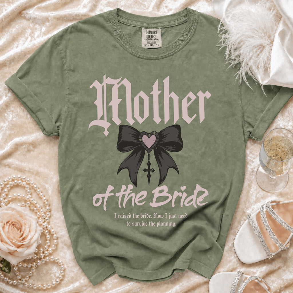 Olive green t-shirt with "Mother of the Bride" gothic font and bow graphic.