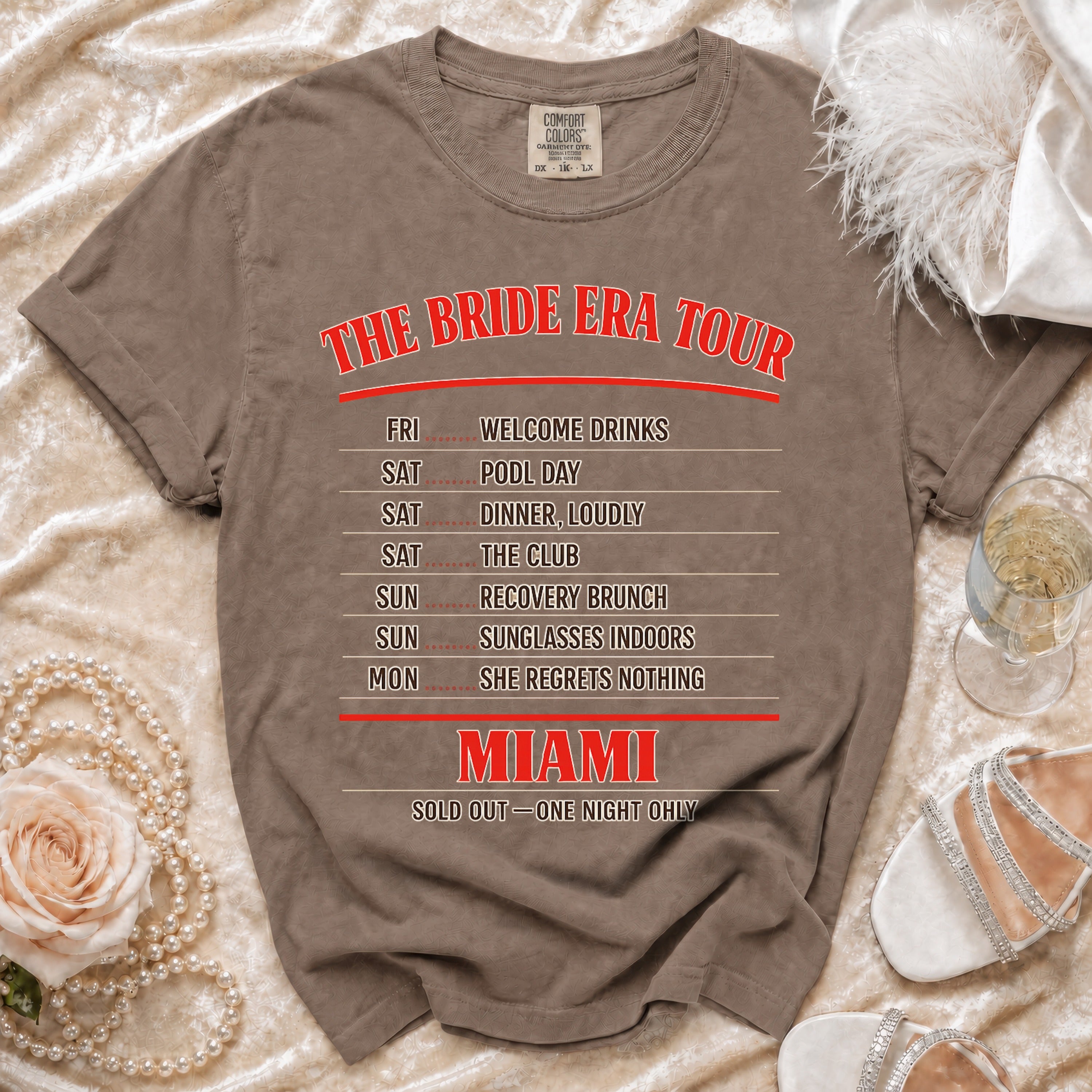 Bride Era Tour Miami t-shirt with schedule and "Sold Out" text.