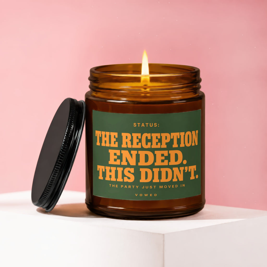 Amber candle burning with text: "STATUS: THE RECEPTION ENDED. THIS DIDN'T. THE PARTY JUST MOVED IN VOWED."