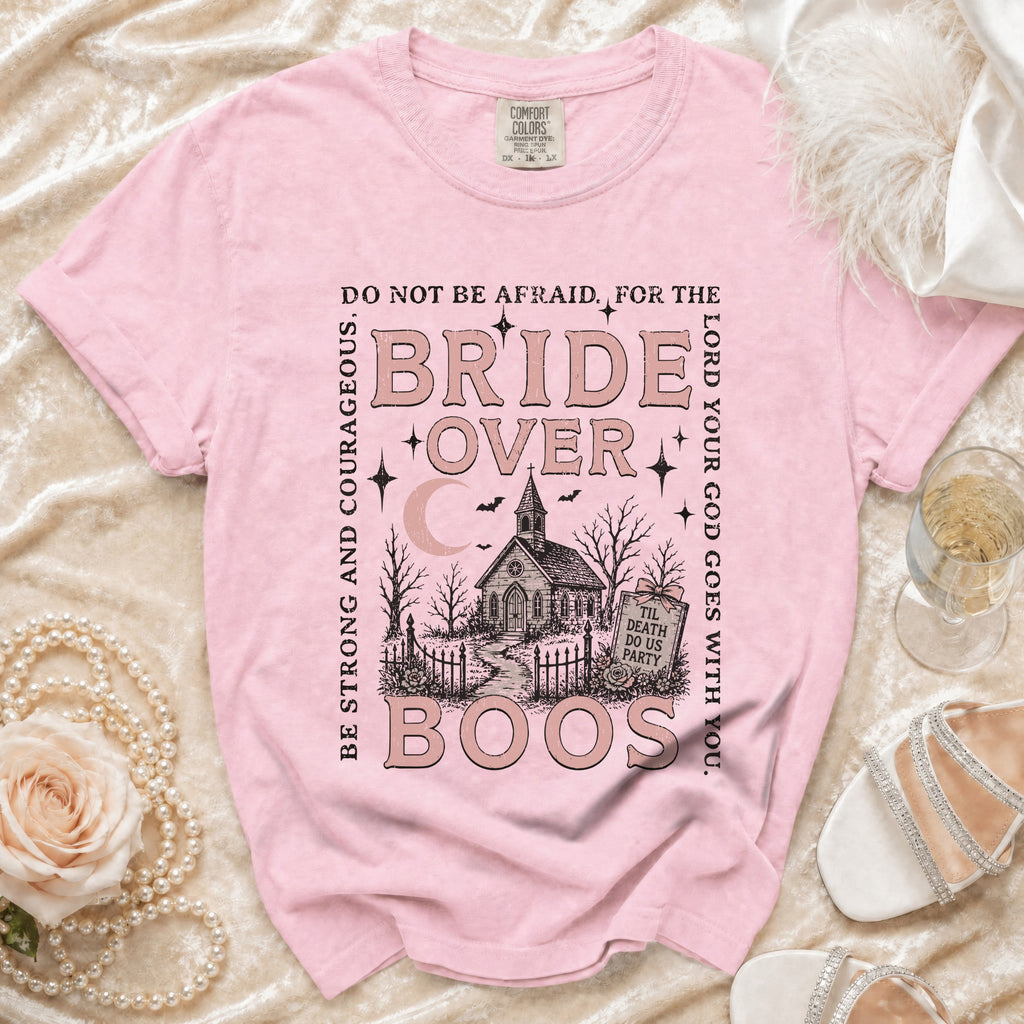 Pink t-shirt with "Bride Over Boos" graphic, a church, and spooky elements.