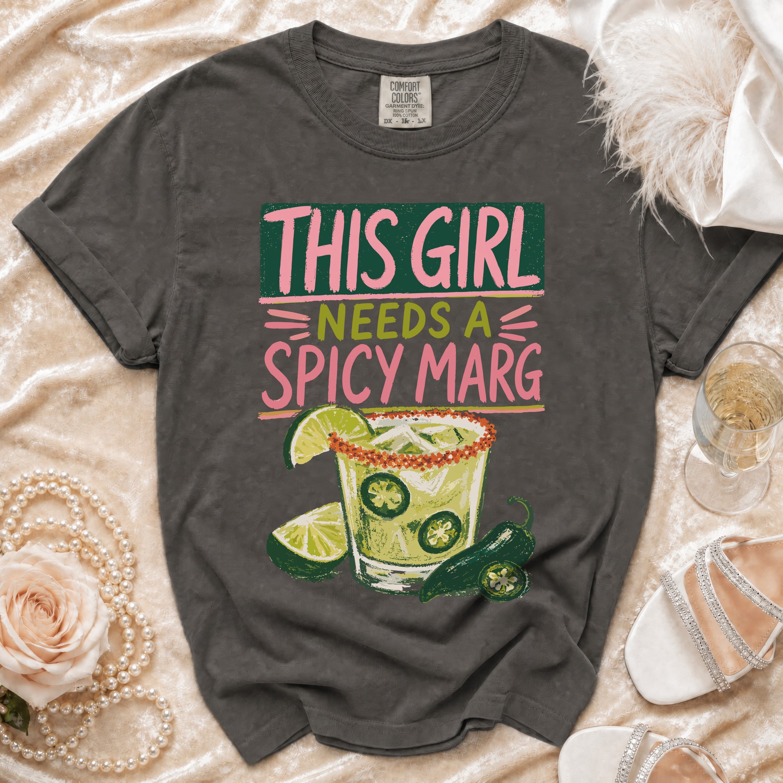 Dark gray t-shirt with "This Girl Needs a Spicy Marg" text and spicy margarita graphic.