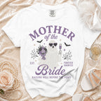 White t-shirt with "Mother of the Bride Forever Haunted" text and ghost graphic.