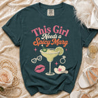 Teal t-shirt with "This Girl Needs a Spicy Marg" graphic and margarita.