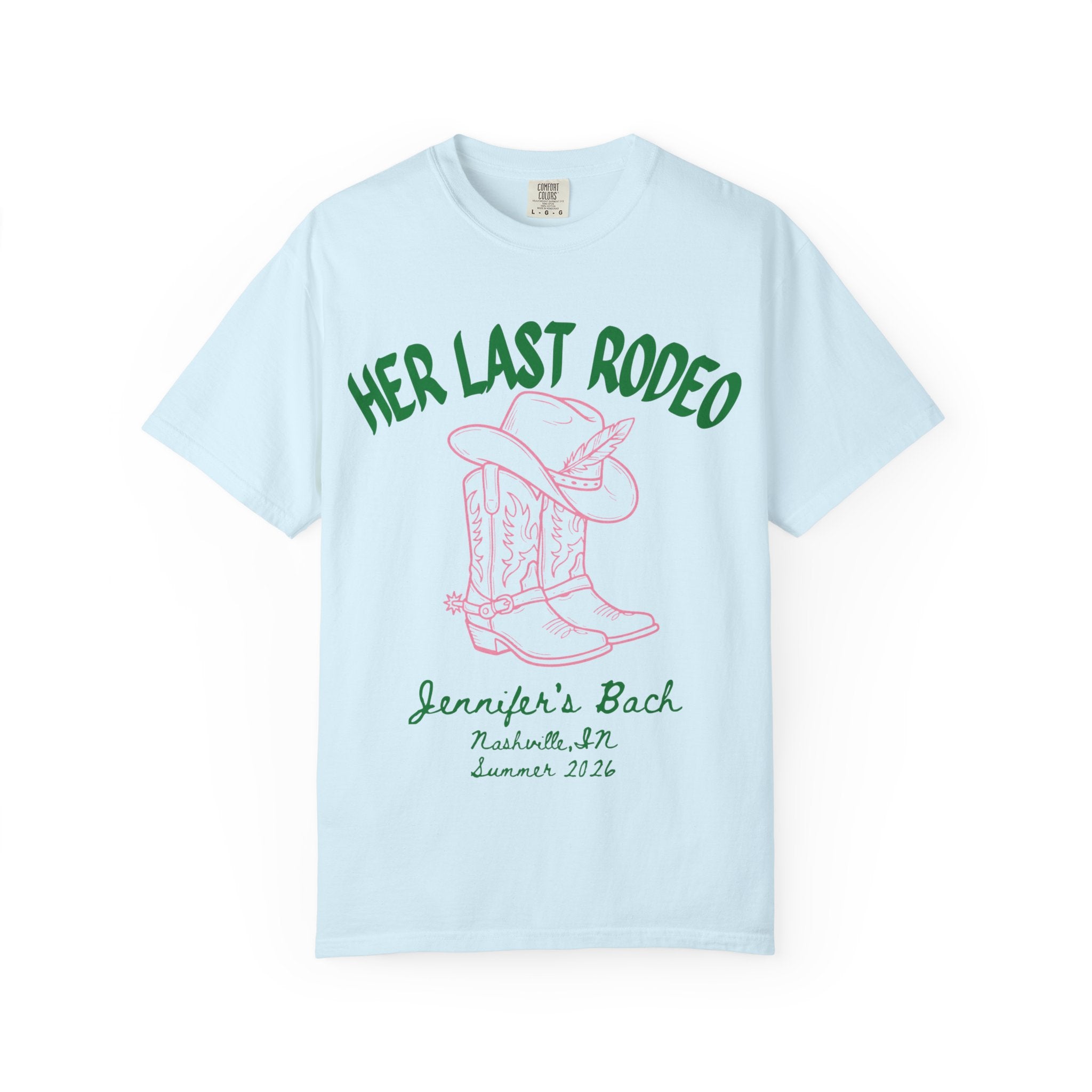 Light blue t-shirt with pink "HER LAST RODEO" text, cowboy boots, and hat.