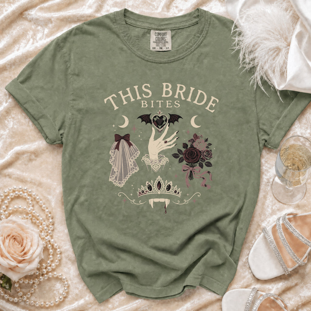 Olive green t-shirt with "This Bride Bites" text and gothic vampire bride graphics.