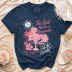 Navy t-shirt with "This Girl Needs a Margarita" text and tropical graphics.