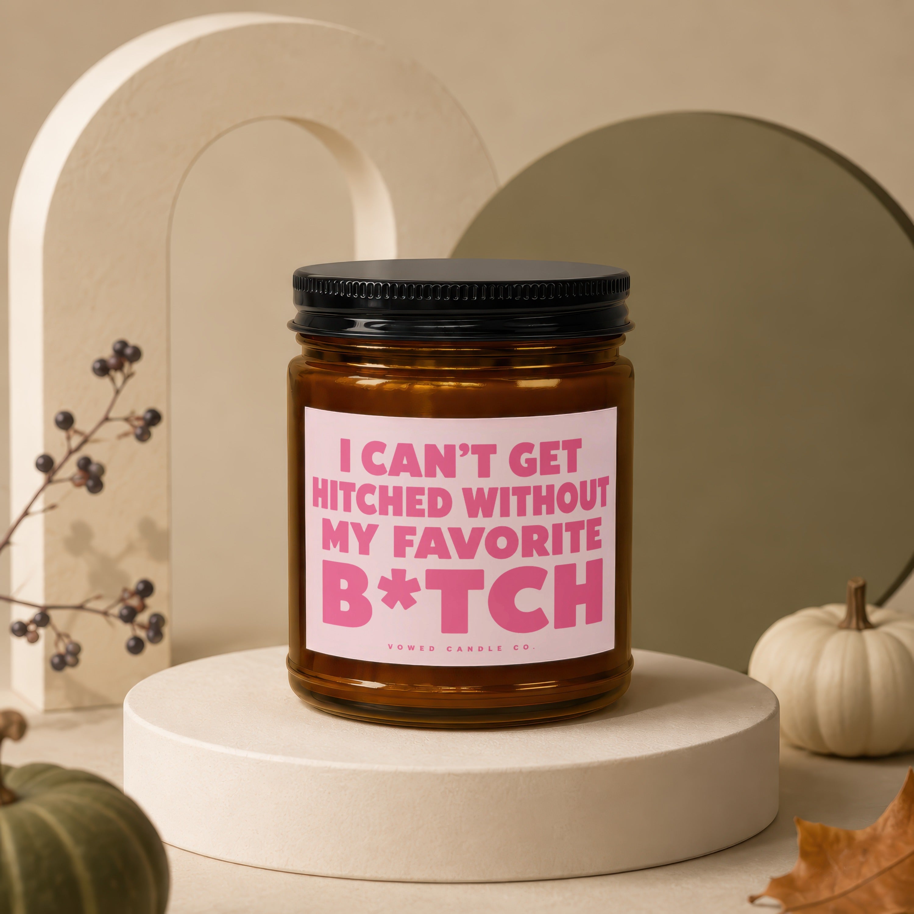 Candle with pink label reading "I CAN'T GET HITCHED WITHOUT MY FAVORITE B*TCH"