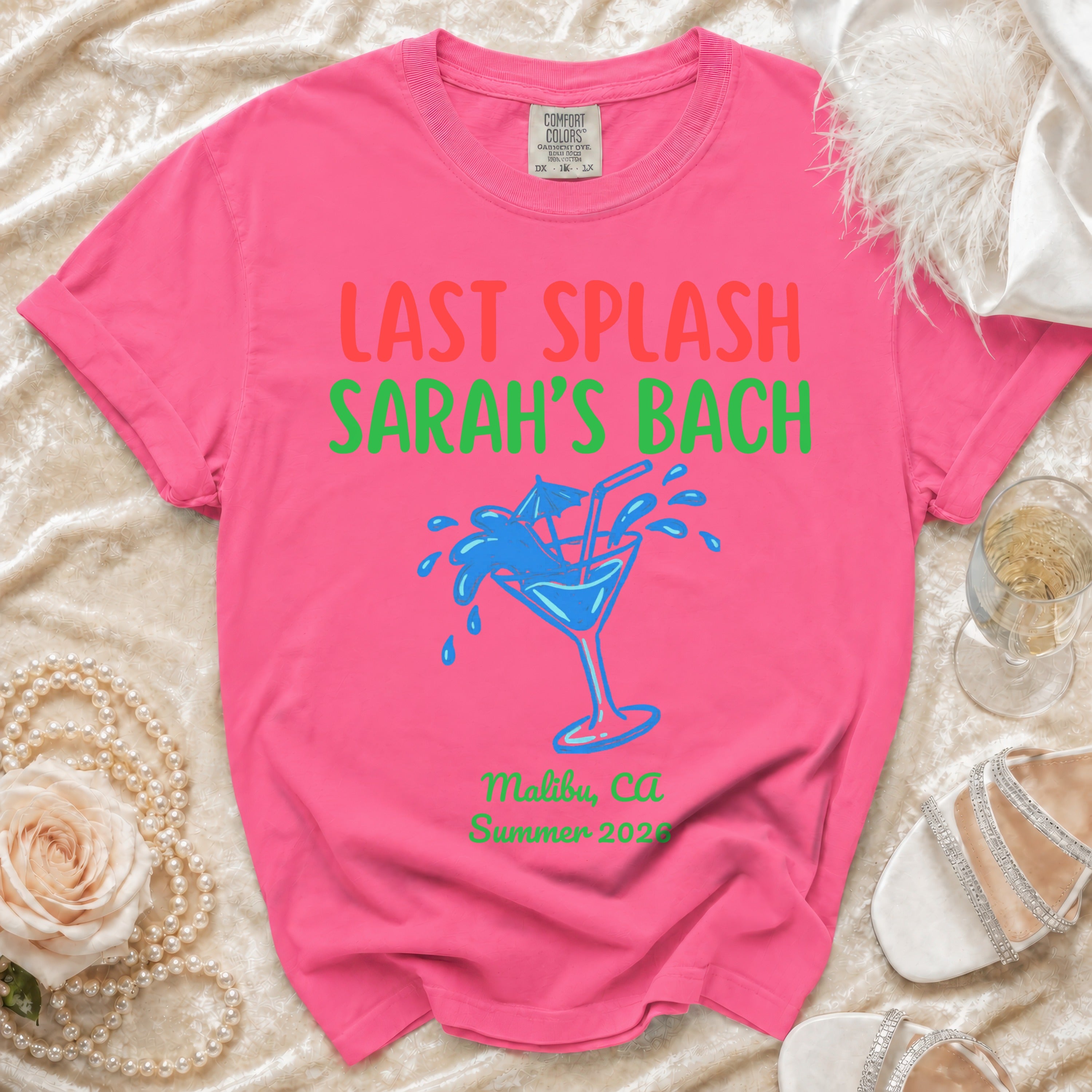 Pink t-shirt with "LAST SPLASH SARAH'S BACH" and martini glass.