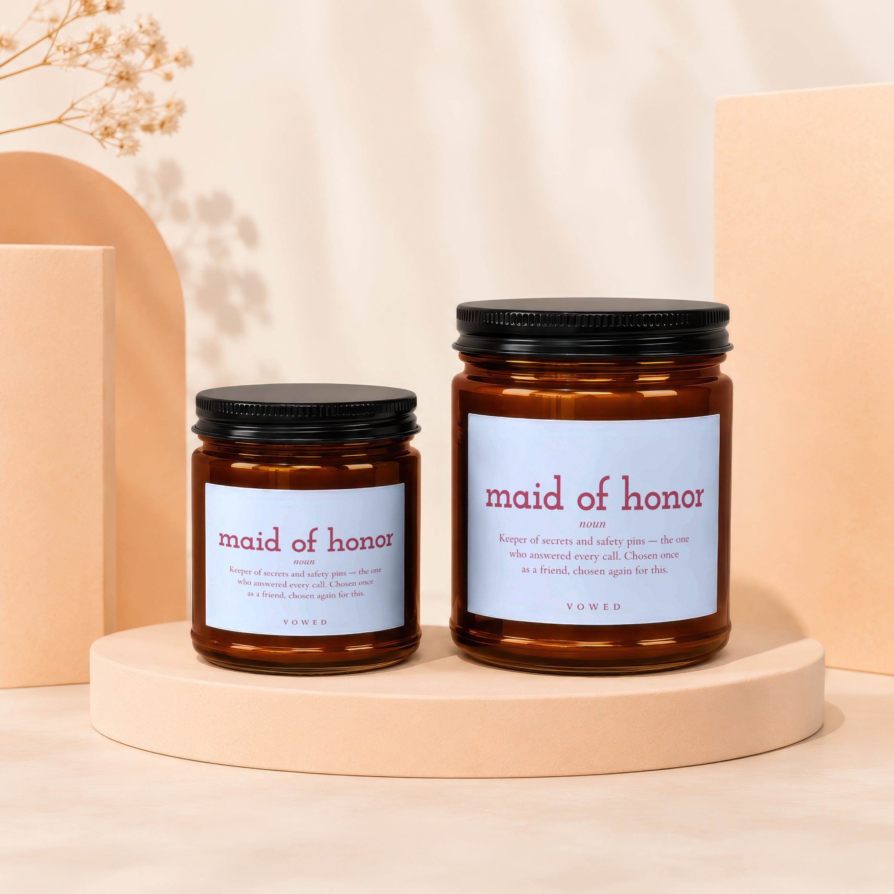 Two amber glass candles with "maid of honor" text and definitions.