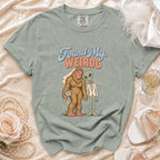 Green t-shirt with Bigfoot bride and alien groom graphic saying "Found My Weirdo."