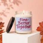 Glass jar candle with a lit wick, featuring "Fine Better Together" text.
