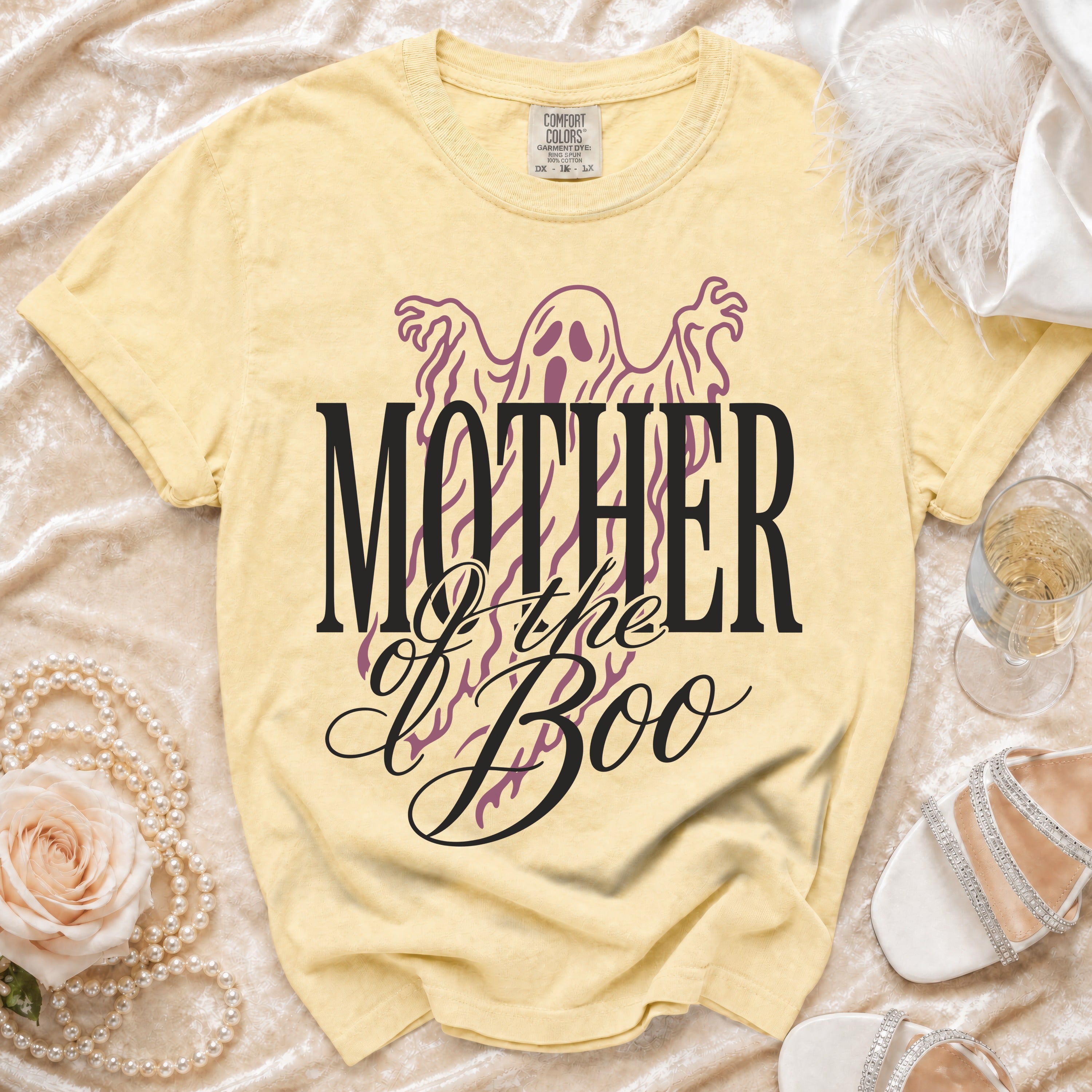 Yellow t-shirt with "Mother of the Boo" text and ghost graphic.