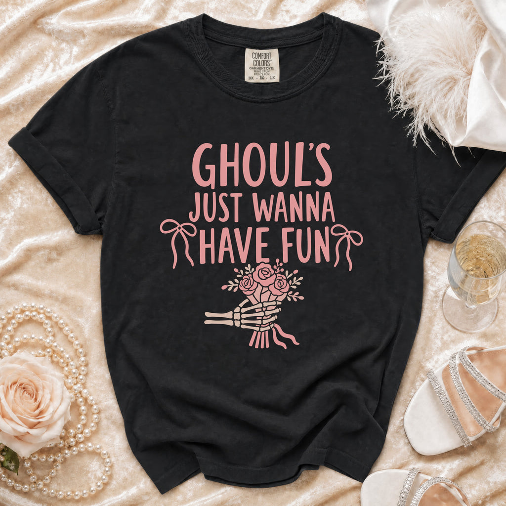 Black t-shirt with pink "Ghoul's Just Wanna Have Fun" text and skeleton hand bouquet.