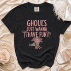 Black t-shirt with pink "Ghoul's Just Wanna Have Fun" text and skeleton hand bouquet.