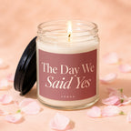 Glass candle with pink label reading "The Day We Said Yes" and "VOWED".