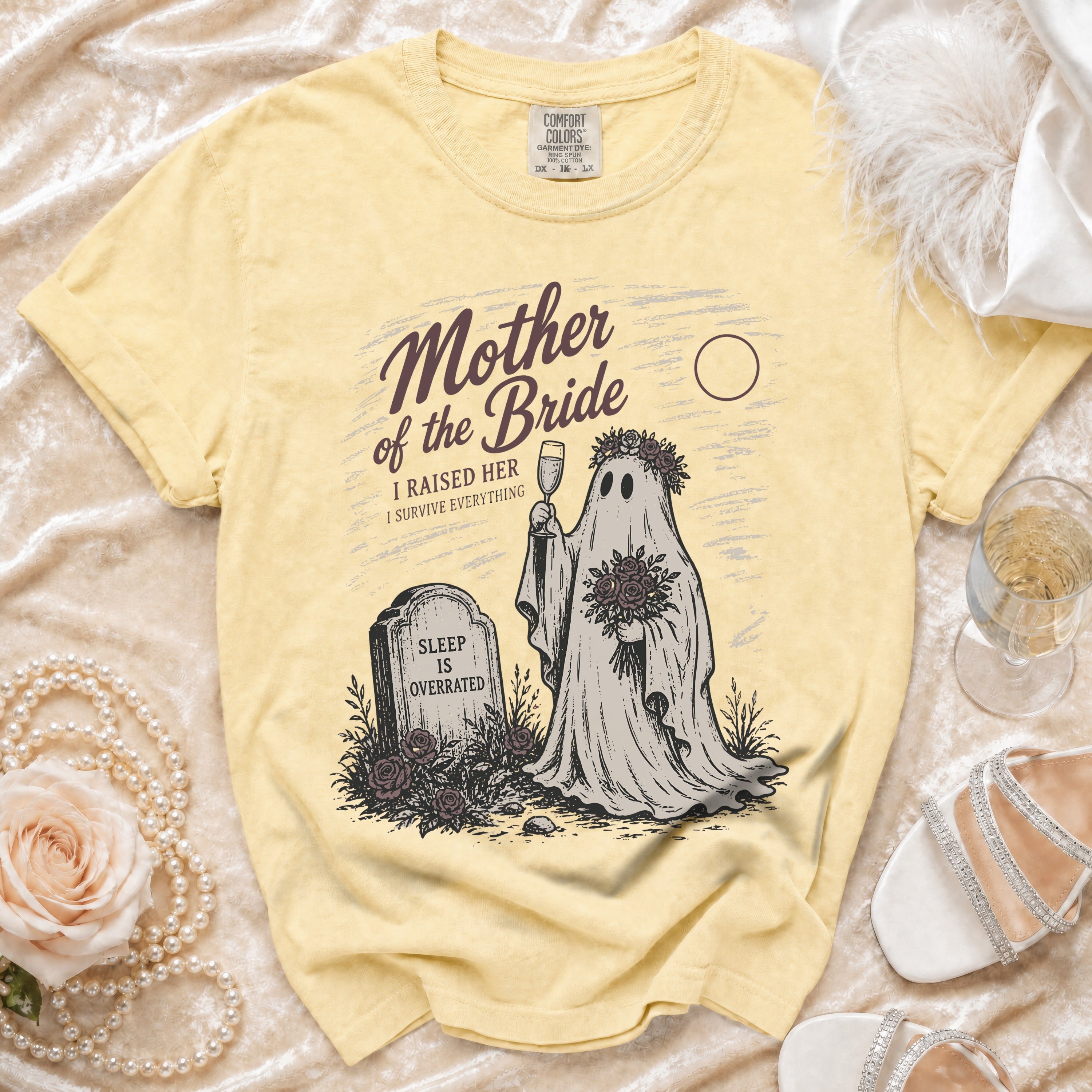 Yellow t-shirt with ghost graphic "Mother of the Bride" and tombstone.