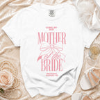White t-shirt with "Doing My Best Mother of the Bride Emotional Support VIP" pink text.