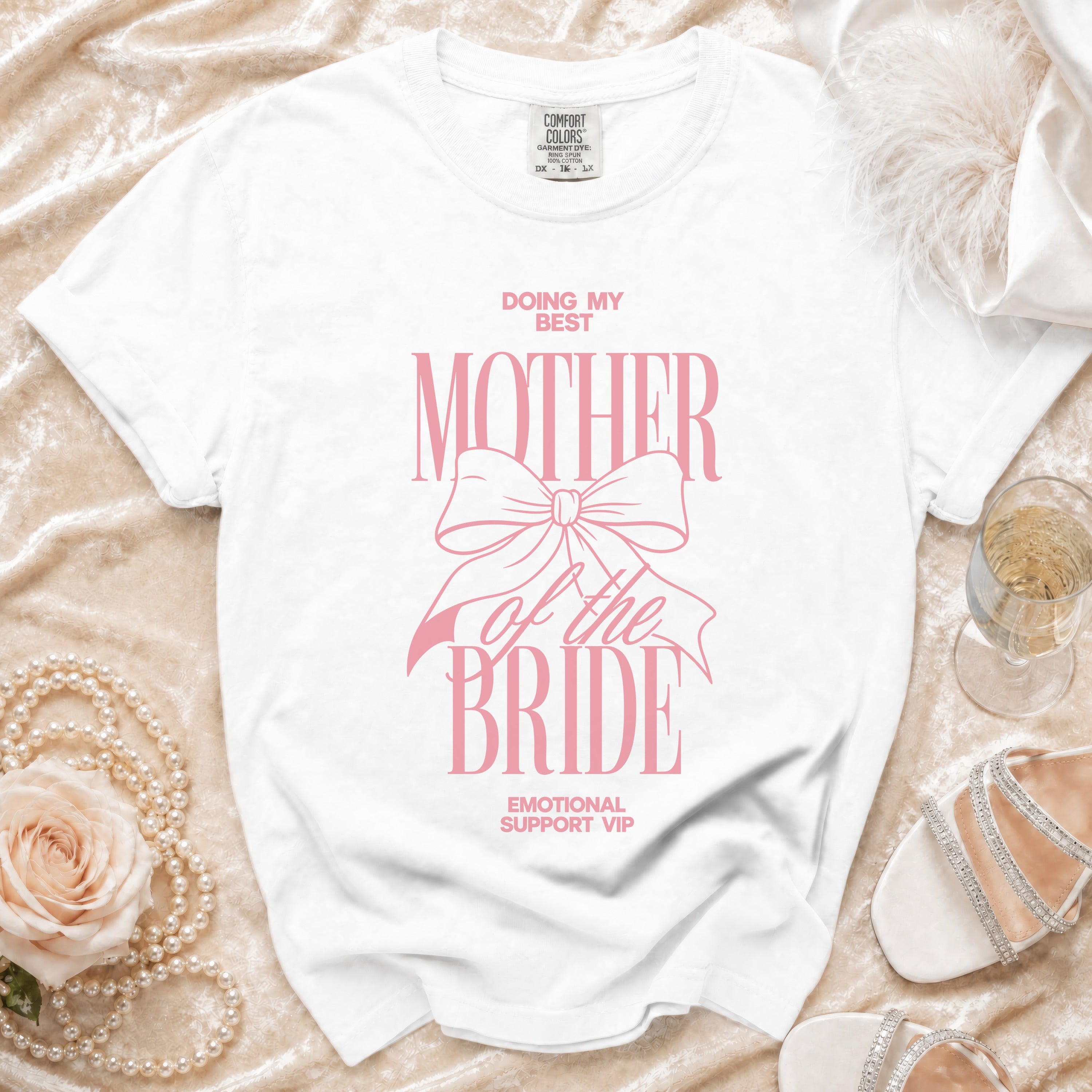 White t-shirt with "Doing My Best Mother of the Bride Emotional Support VIP" pink text.