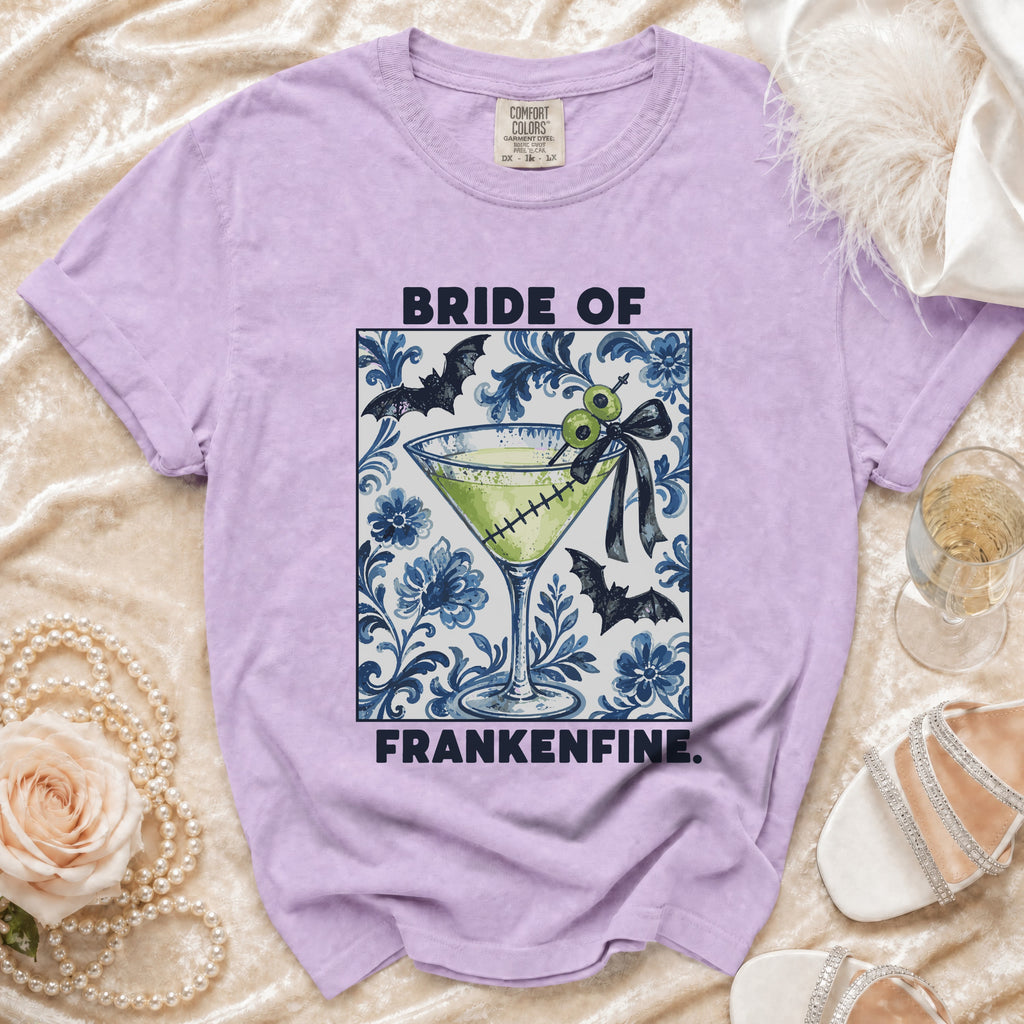 Lavender t-shirt with "Bride of Frankenfine" text and Halloween martini graphic.