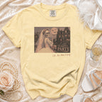 Yellow t-shirt with skeleton bride, haunted mansion, and text "Til Death Do Us PARTY".