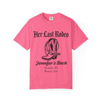 Pink t-shirt with "Her Last Rodeo" and cowboy boot graphic.