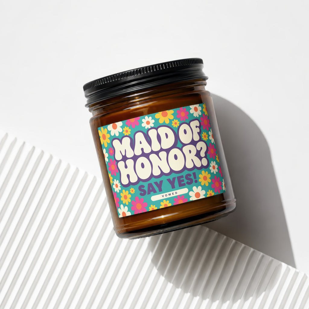 Brown candle with black lid and label reading "MAID OF HONOR? SAY YES!"