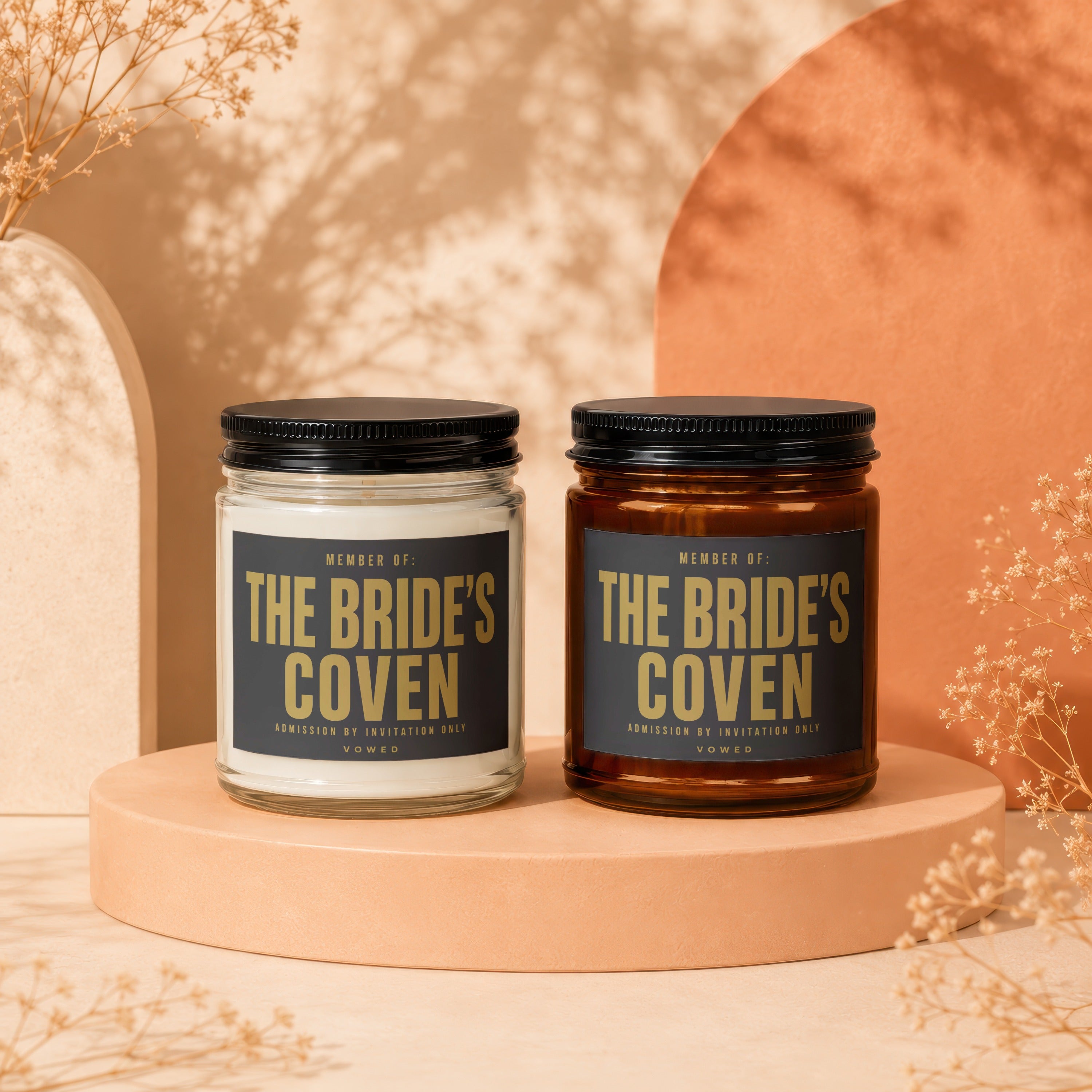 Two candles labeled "The Bride's Coven" displayed on pedestals.