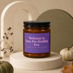 Candle labeled "Welcome to Your Pre-Wedding Era. Showers, Fittings and Happy Tears."