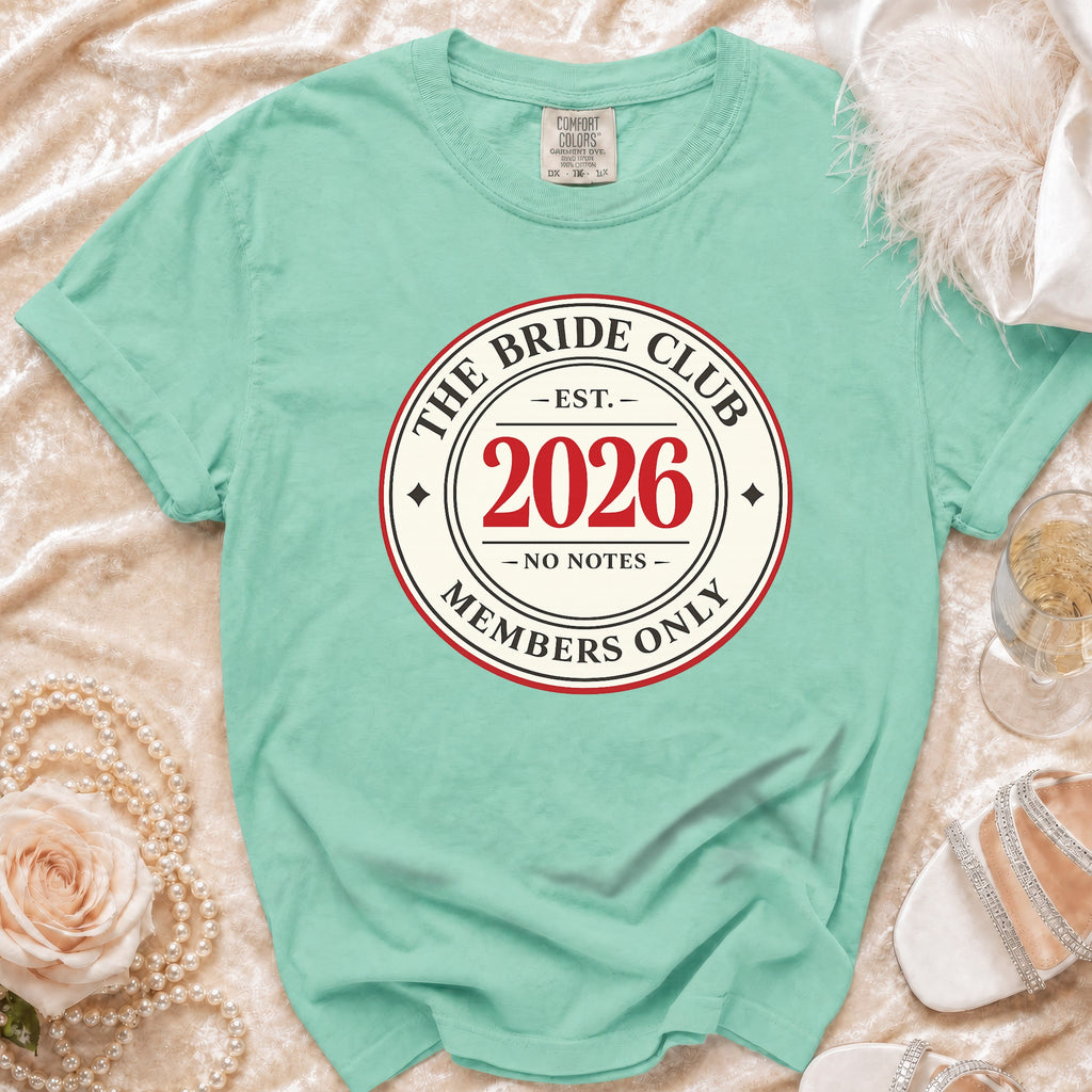 Aqua t-shirt with "The Bride Club Est. 2026 Members Only" graphic.