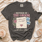 Dark gray t-shirt with "MOTHER OF THE GROOM" and floral design.