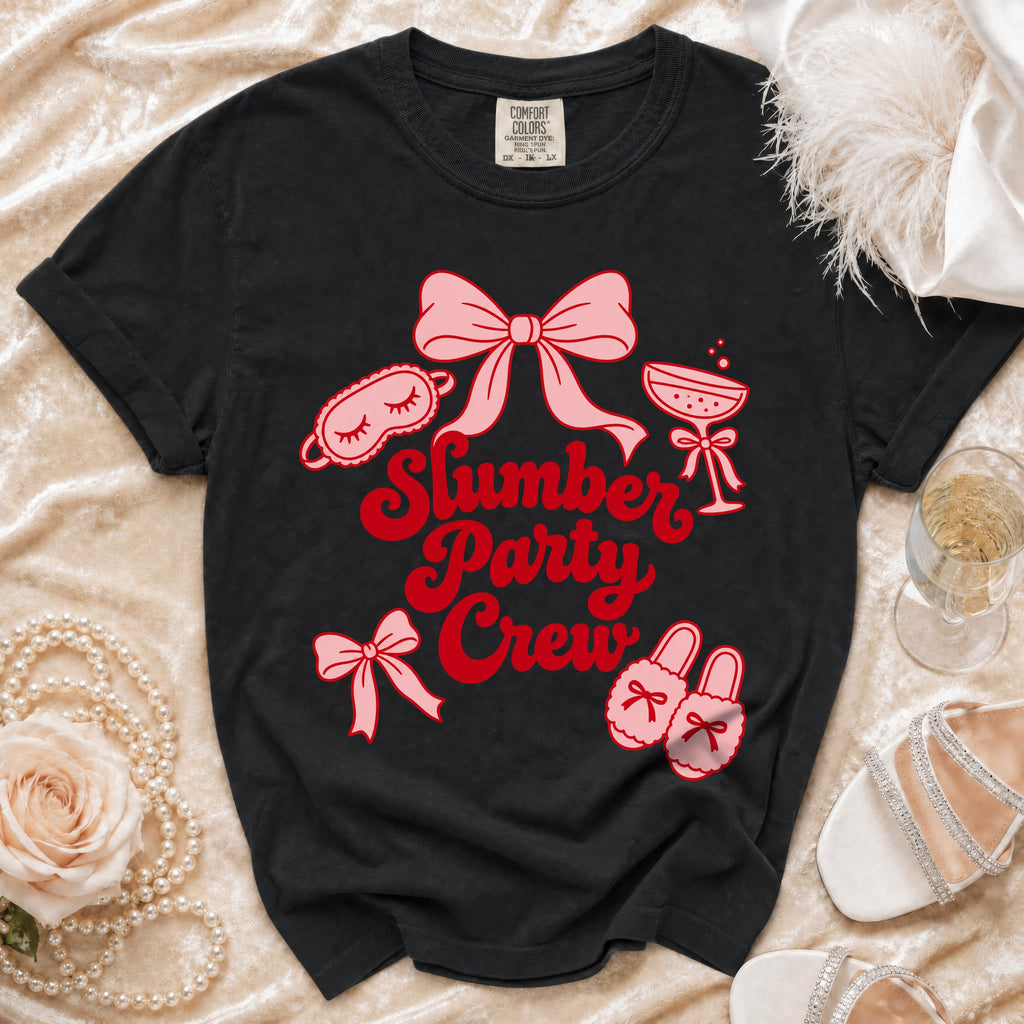 Black t-shirt with "Slumber Party Crew" text and slumber party graphics.