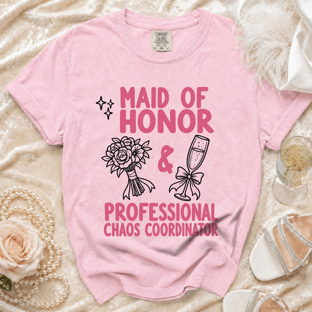 Pink t-shirt with "MAID OF HONOR PROFESSIONAL CHAOS COORDINATOR" text and graphics.