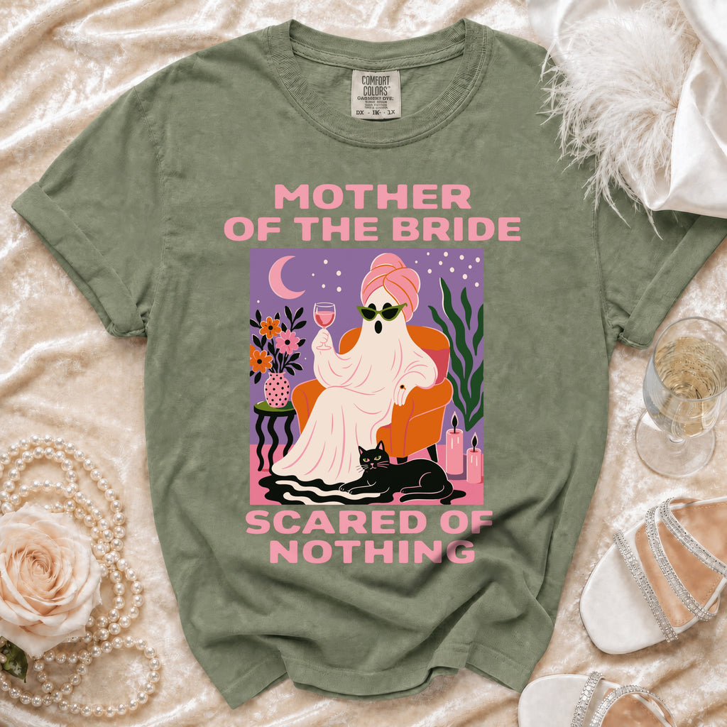 Olive green t-shirt with "MOTHER OF THE BRIDE SCARED OF NOTHING" text and ghost graphic.