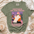 Olive green t-shirt with "MOTHER OF THE BRIDE SCARED OF NOTHING" text and ghost graphic.