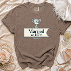 Brown t-shirt with "Married to Win" text and wedding rings in a trophy design.