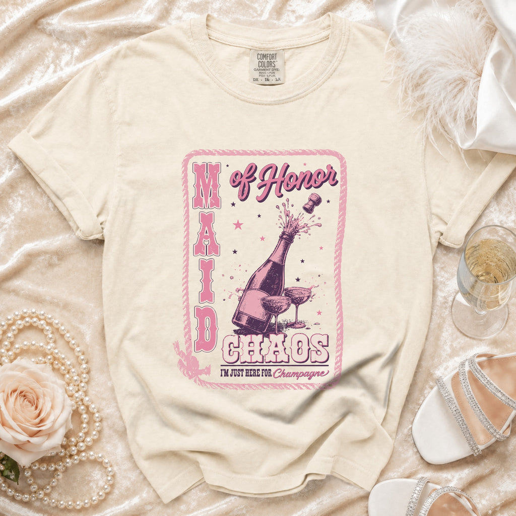 T-shirt with "Maid of Honor Chaos I'm Just Here for Champagne" graphic and champagne bottle.