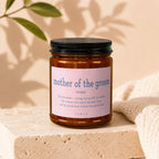 Amber jar candle with label "Mother of the Groom noun" and sentiment.
