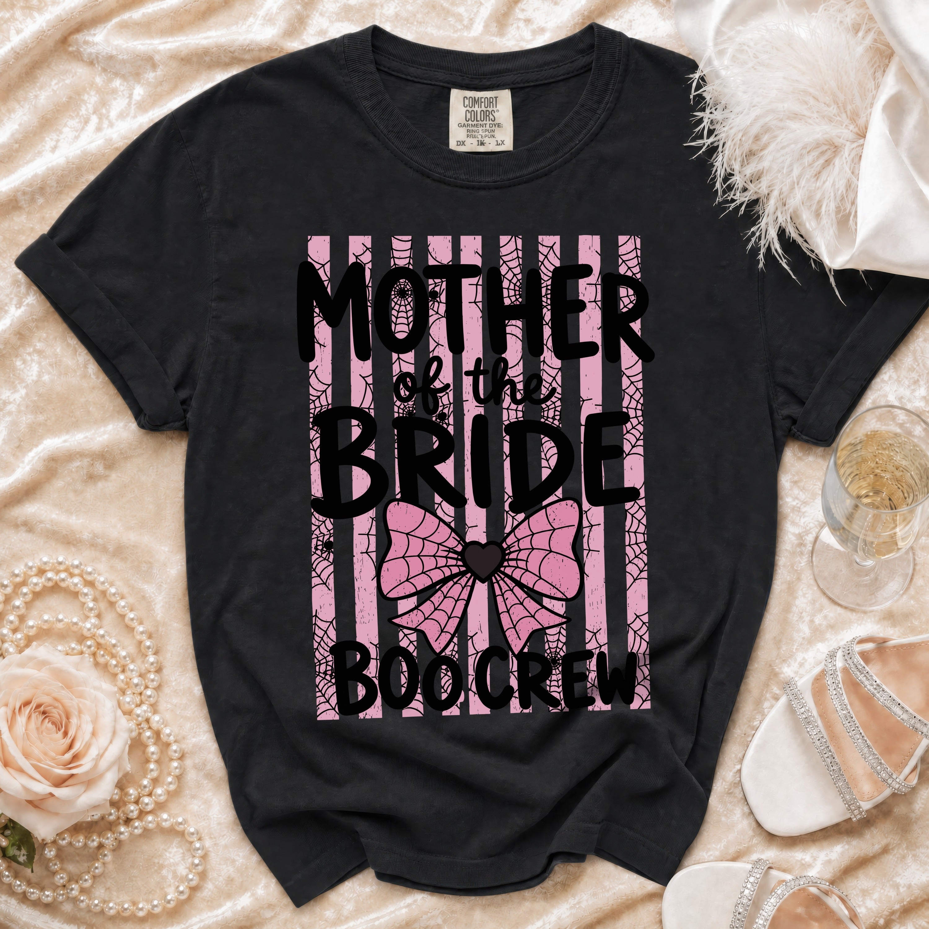 Black t-shirt with "Mother of the Bride Boocrew" text and spiderweb design.