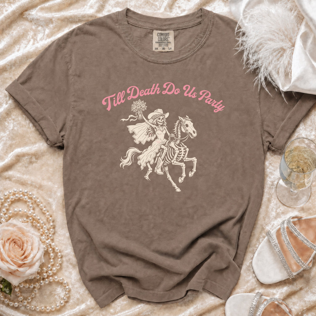 Brown Comfort Colors t-shirt with "Till Death Do Us Party" and skeleton bride on horse graphic.